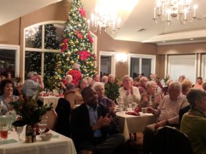 diners around Christmas Tree at Country Club